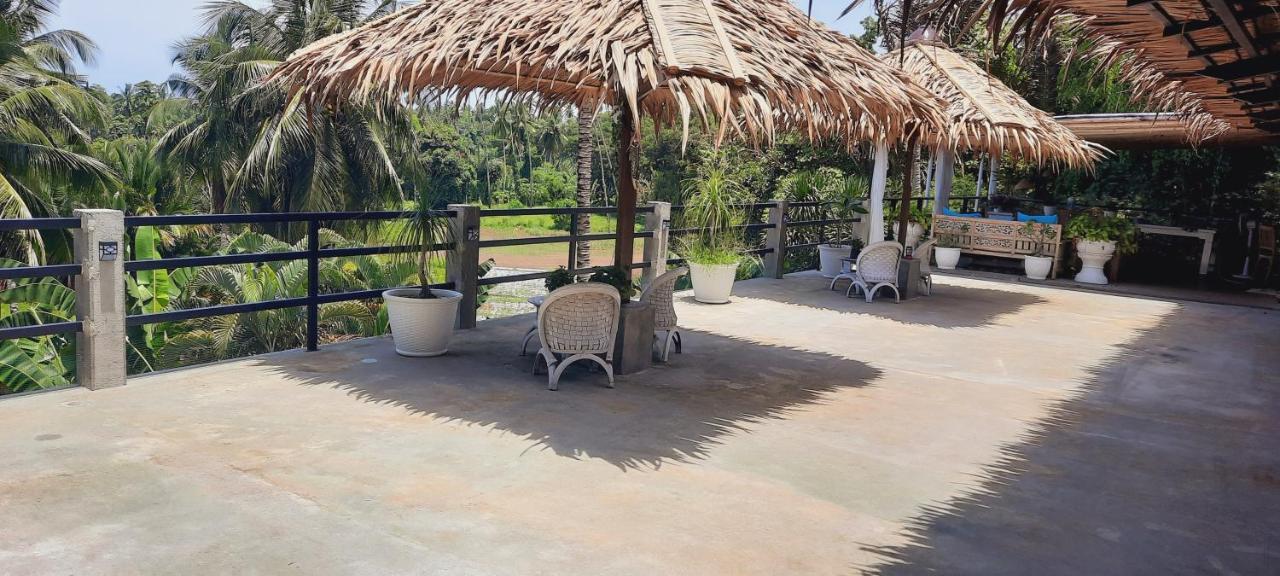 מנאדו Guesthouse The 4 Fish מראה חיצוני תמונה